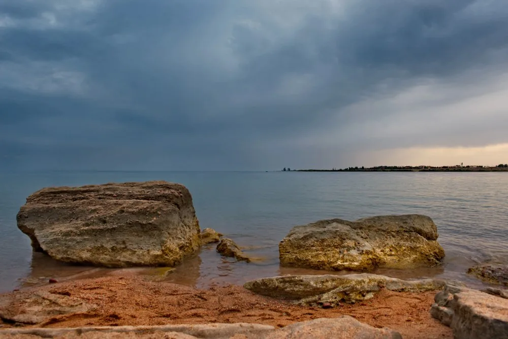 Rare Medieval Coins Discovered in Kyrgyzstan’s Lake Issyk-Kul